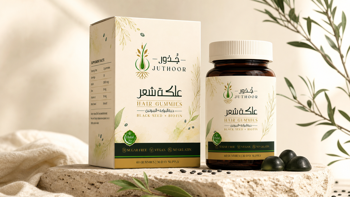 Juthoor jar and carton on a bathroom counter beside a mirror